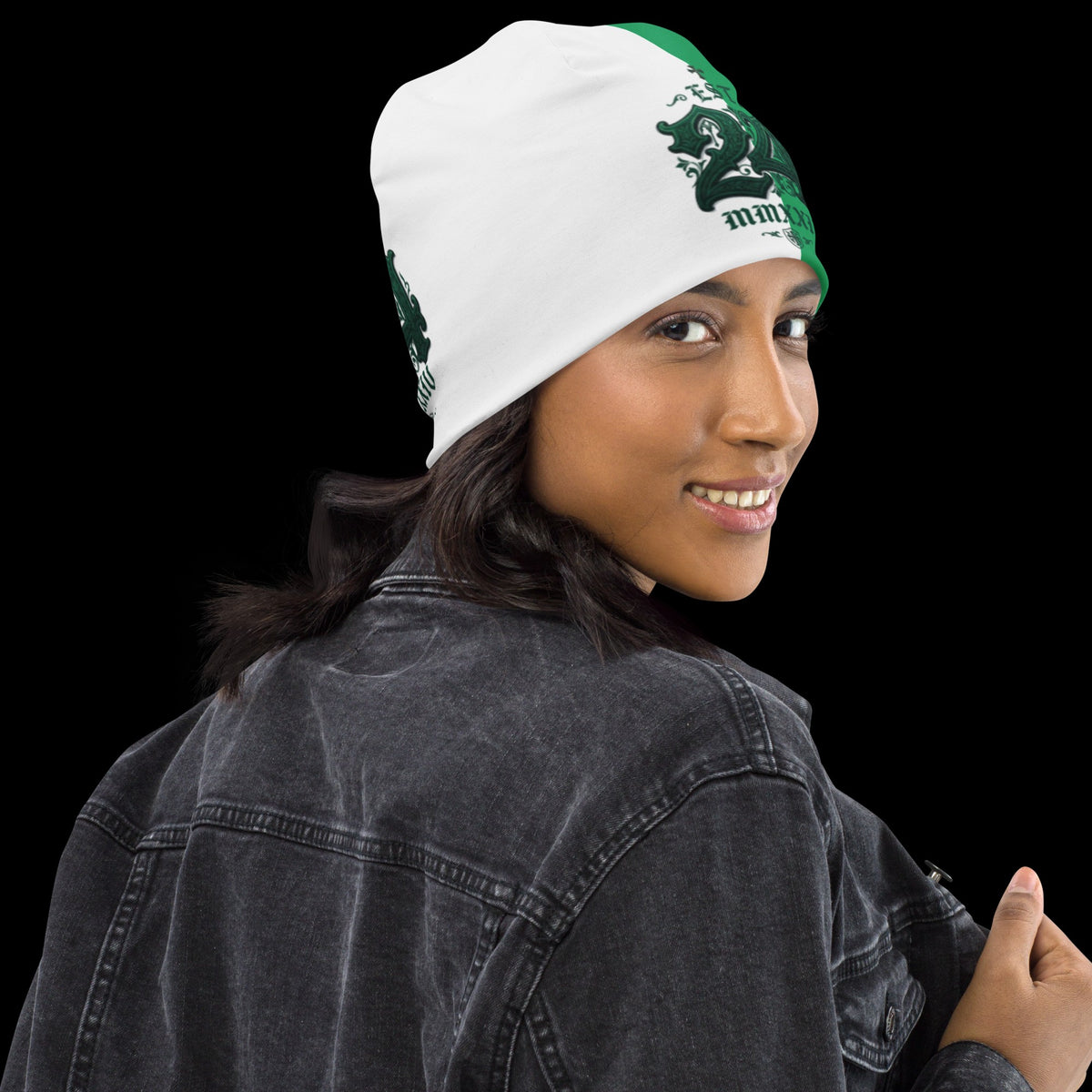 Street Culture double-layered beanie with white and green graphic print worn by a smiling woman in a denim jacket