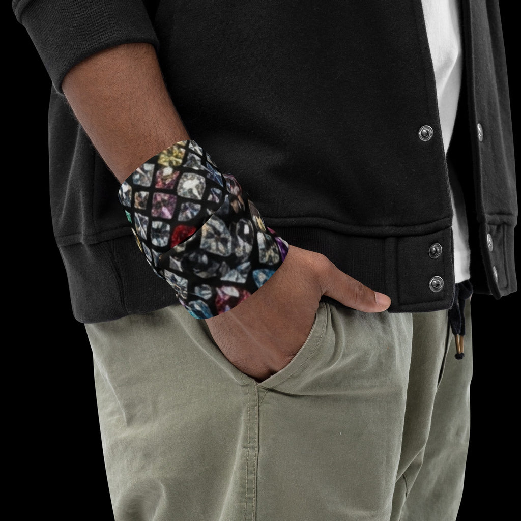 Street Culture neck gaiter worn as a wristband featuring a colorful diamond pattern on breathable stretch fabric