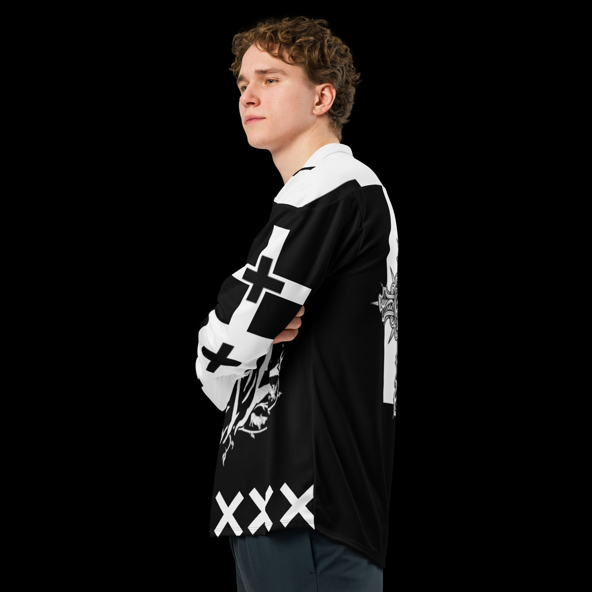 Street Culture recycled hockey jersey in black and white with graphic prints, worn by a man in a side profile view.