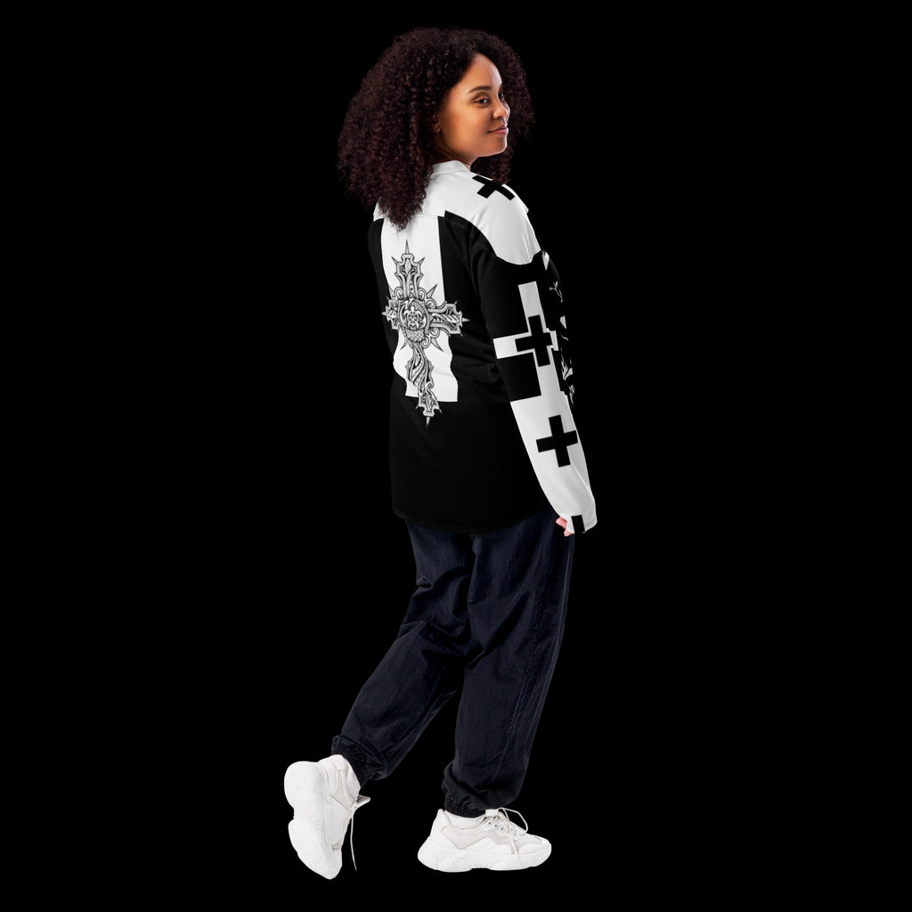 Street Culture recycled hockey jersey in black and white with gothic cross print, worn by a woman looking back.