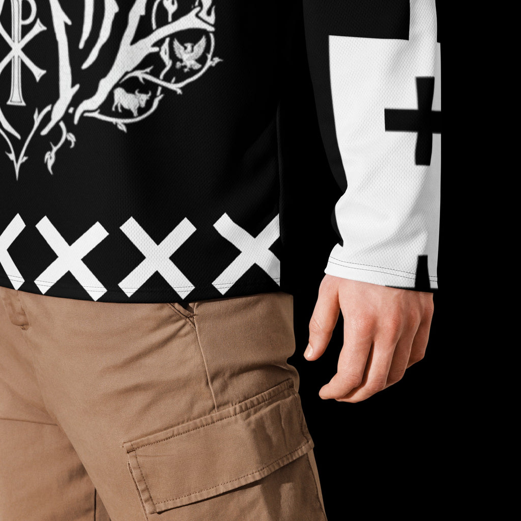 Street Culture recycled hockey jersey in black and white with graphic print, worn with khaki cargo pants.