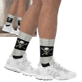 Street Culture crew socks featuring a skull graphic and Japanese text on a black background with white sneakers.