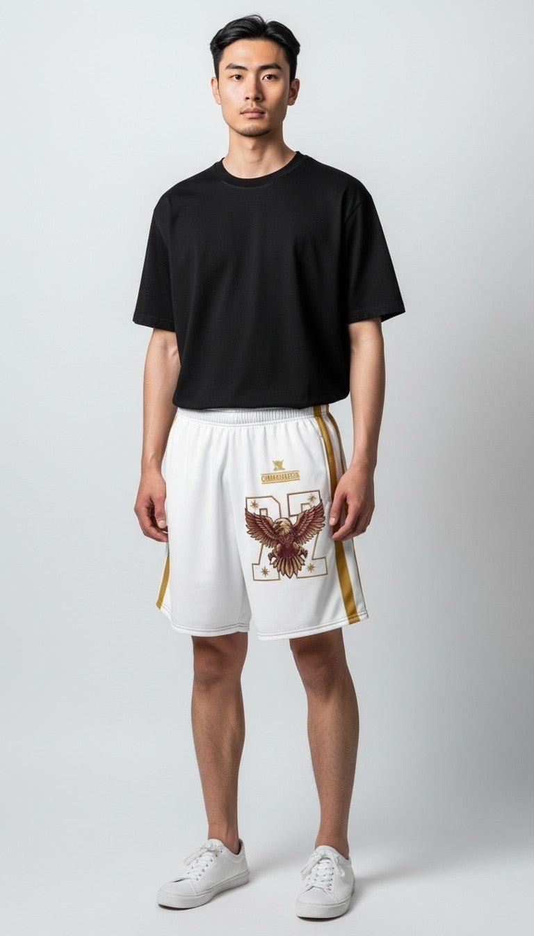Street Culture unisex athletic shorts in white with eagle graphic, gold side stripes, and elastic waistband.